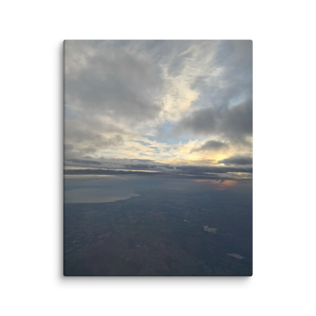 Canvas Sunset hidden in the Clouds from Above